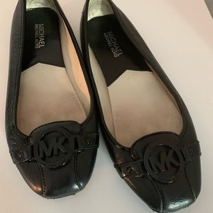 Black Michael Kors flats size 8.